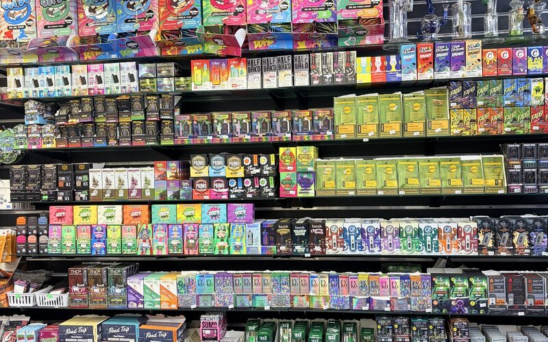Shelves of cigarillos and natural leaf wraps.